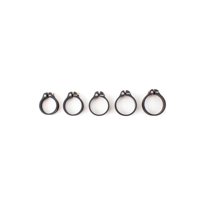 Five Carbon-Ti X-Clamp 3 seatpost clamps in black, lined up from the smallest diameter to the largest.