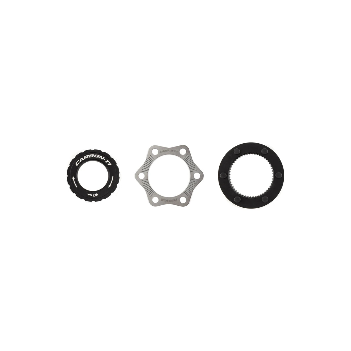 Carbon-Ti X-Rotor Center Lock Adapter Kit: the lockring, the titanium protection plate and the adapter.