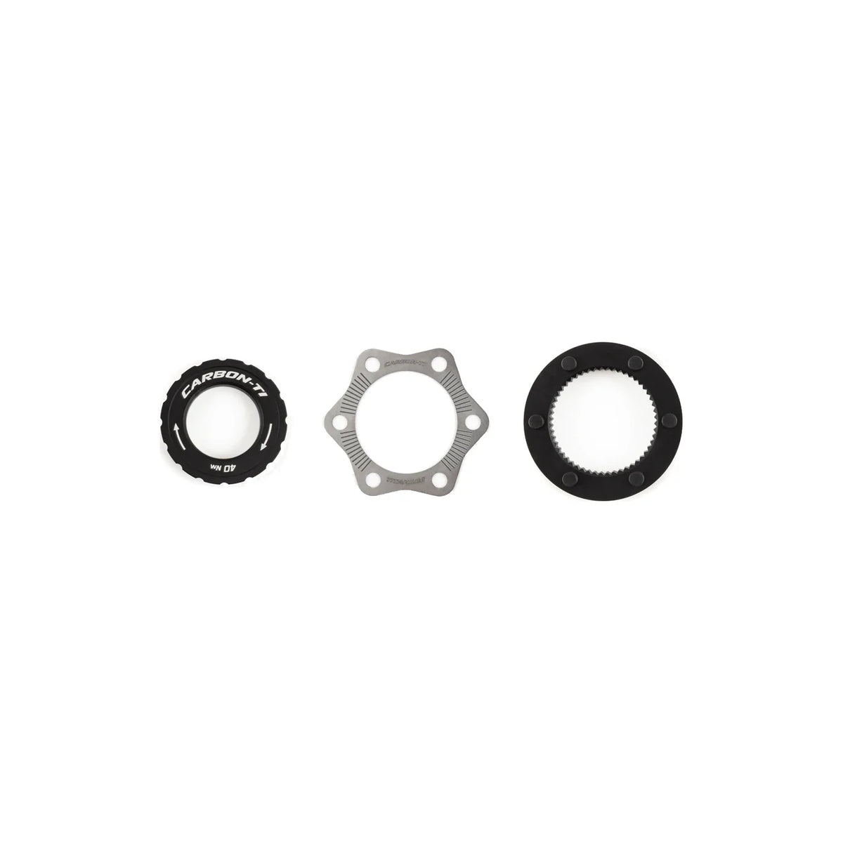Carbon-Ti X-Rotor Center Lock Adapter Kit: the lockring, the titanium protection plate and the adapter.