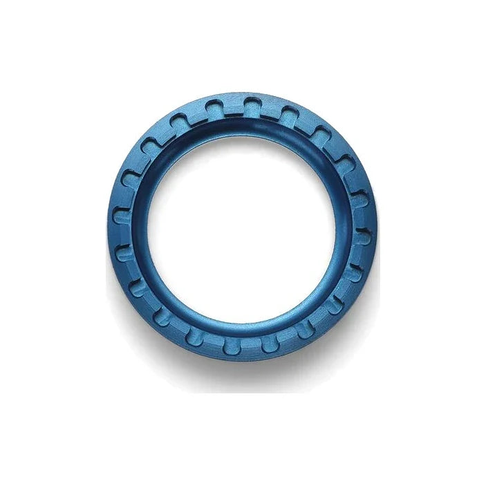 A lockring from the Garbaruk Crankset Self-Extractor Set in Blue, seen from above.
